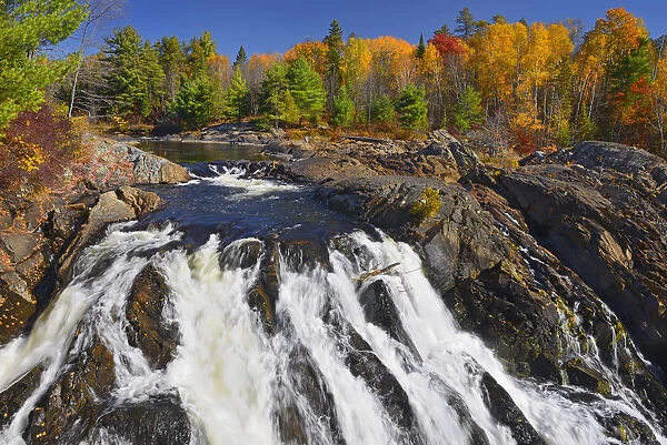 Canada, Ontario, Chutes Provincial Park. Aux Sables River flows into waterfall. Credit as