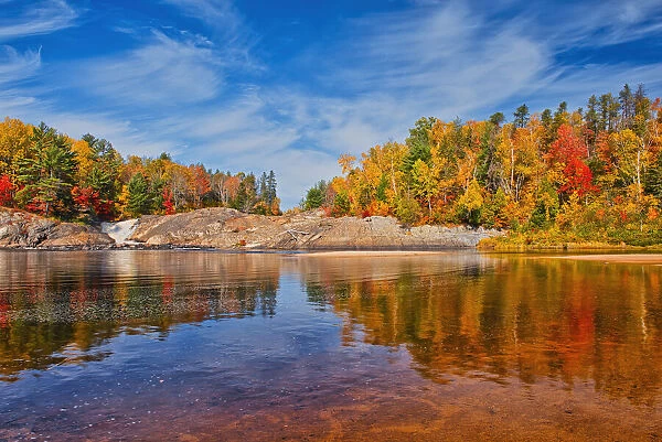 Canada, Ontario, Chutes Provincial Park. Reflections on Aux Sables River in autumn