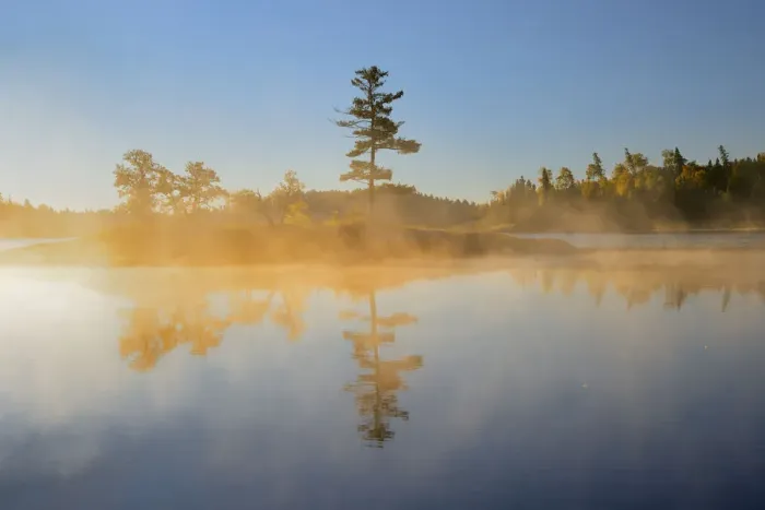 Framed Print : Canada, Ontario, Kenora. Sunrise reflections on Middle Lake fog