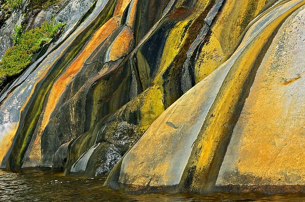 Canada, Ontario, Key River. Rock face stained with runoff water