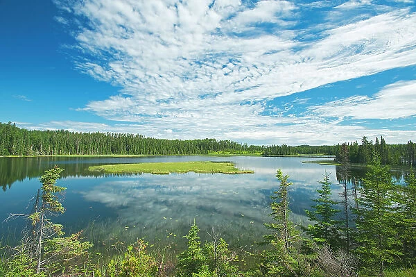 Canada, Ontario, Longlac. Clouds and wetland in a boreal forest