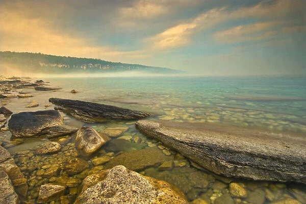 Canada, Ontario, Morning fog on Georgian Bay. Limestone Rock. Barrow Bay. Bruce Peninsula