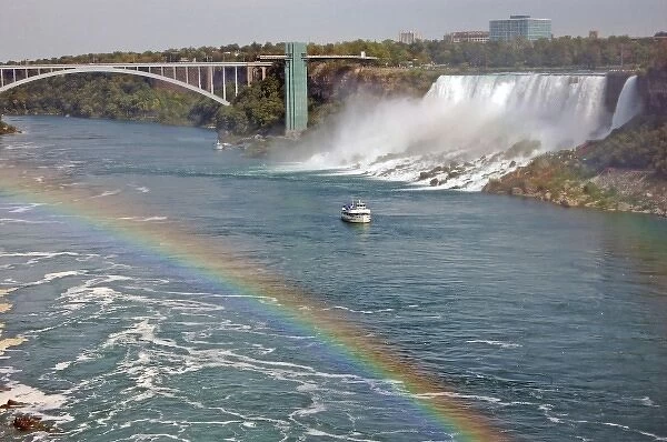 Canada, Ontario, Niagara Falls. Maid of the Mist boat ride under a rainbow