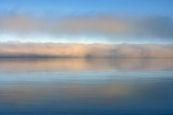 Canada, Ontario, Rossport. Fog on Lake Superior at sunrise
