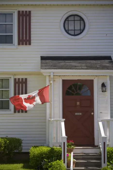 Framed Print : Canada, Prince Edward Island, Charlottetown. Historic home flying Canadian flag Framed Print : Canada, Prince Edward Island, Charlottetown. Historic home flying Canadian flag
