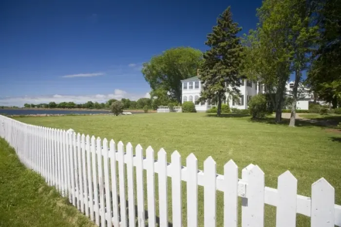 Framed Print : Canada, Prince Edward Island, Charlottetown. Historic waterfront house with white picket fence