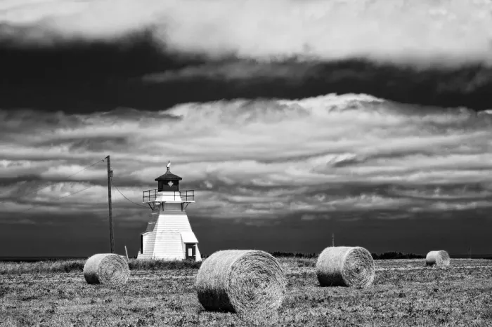 Framed Print : Canada, Prince Edward Island, Darnley. Lighthouse and hay bales Framed Print : Canada, Prince Edward Island, Darnley. Lighthouse and hay bales