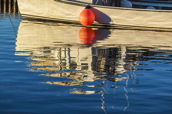 Canada, Prince Edward Island, Malpeque. Fishing boat reflection