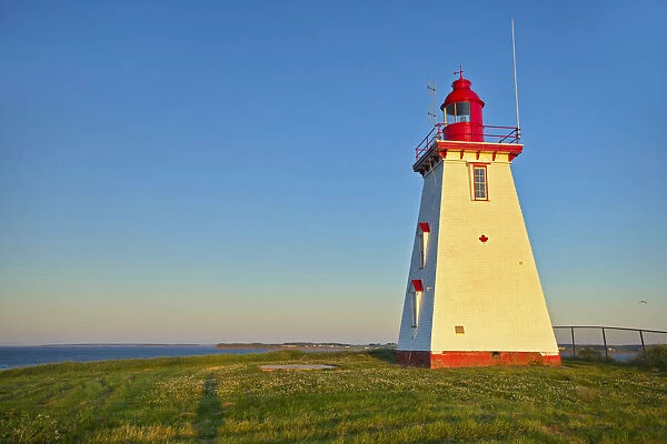 Canada, Prince Edward Island. Souris East Lighthouse on Knight Point at sunrise