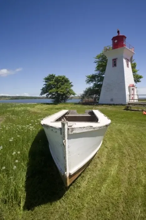 Framed Print : Canada, Prince Edward Island, Victoria. Lighthouse with maple leaf, and rescue boat Framed Print : Canada, Prince Edward Island, Victoria. Lighthouse with maple leaf, and rescue boat