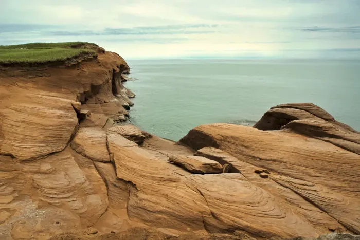Framed Print : Canada, Quebec, Iles-de-la-Madeleine. Red cliffs and ocean Framed Print : Canada, Quebec, Iles-de-la-Madeleine. Red cliffs and ocean