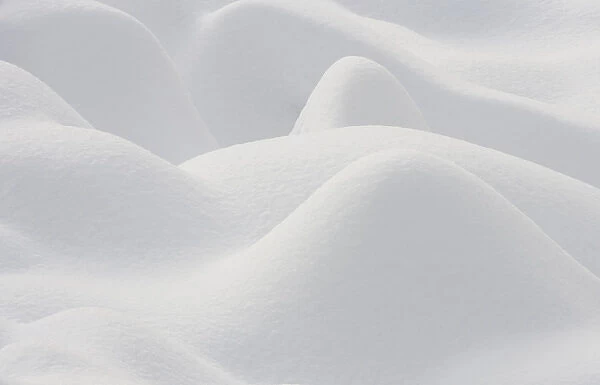Canada, Quebec, Mount St-Bruno Conservation Park. Snow patterns over rocks. Credit as