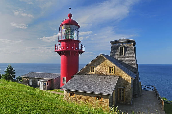 Canada, Quebec, Pointe-a-la-Renommee. Lighthouse on Gulf of St. Lawrence. Credit as
