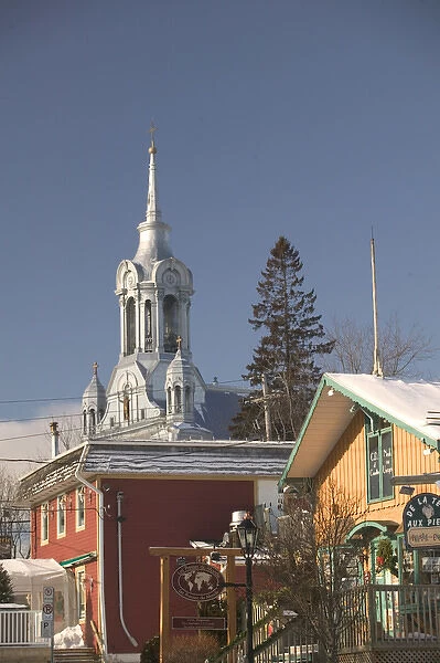 Canada-Quebec-The Laurentians: St. Sauveur des Monts, Town View with Town Church  /  Winter