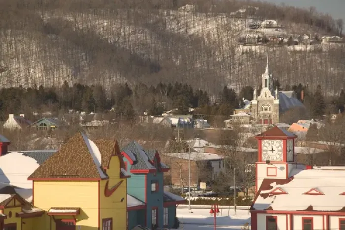 Framed Print : Canada-Quebec-The Laurentians: St. Sauveur des Monts-Town Church from Shopping Village