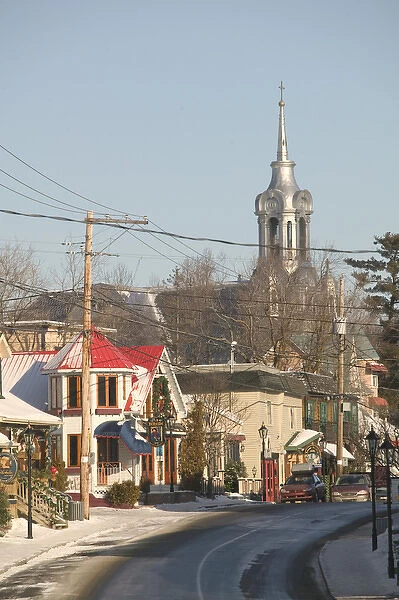 Canada-Quebec-The Laurentians: St-Sauveur des Monts-Town View with Town Church  /  Winter