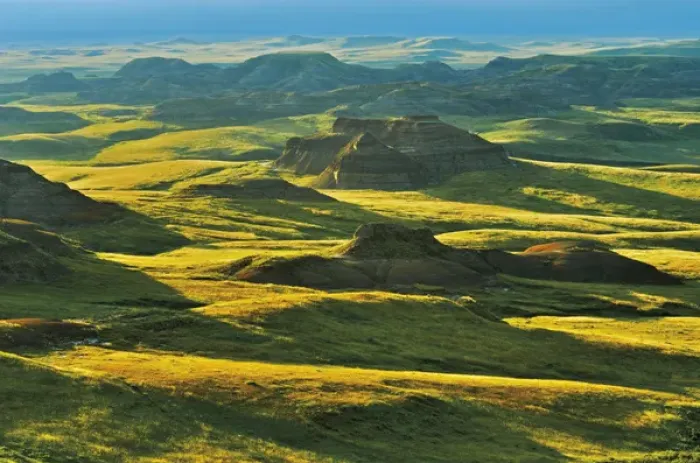 Framed Print : Canada, Saskatchewan, Grasslands National Park. Rolling hills of the Killdeer Badlands at sunset