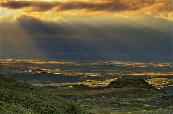 Canada, Saskatchewan, Grasslands National Park. Killdeer Badlands at sunset. Credit as
