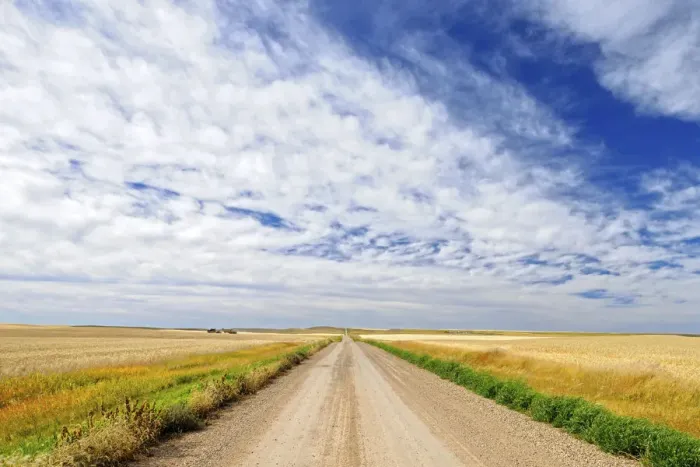 Framed Print : Canada, Saskatchewan, Lepine. Clouds over prairie road at sunrise Framed Print : Canada, Saskatchewan, Lepine. Clouds over prairie road at sunrise