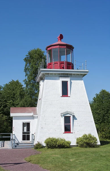 Canada St Martins New Brunswick white tourist lighthouse in small fishing and lobster