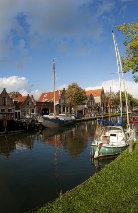 Framed Print : Canal with boats in small town of Edam, the Netherlands Framed Print : Canal with boats in small town of Edam, the Netherlands