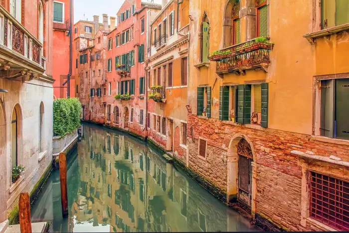 Framed Print : Canal, Venice, Italy. Wide angle view of the colorful, medieval buildings reflecting in the canal Framed Print : Canal, Venice, Italy. Wide angle view of the colorful, medieval buildings reflecting in the canal