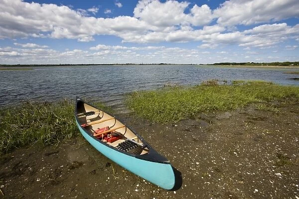 A canoe on the salt marsh side of Long Beach in Stratford, Connecticut. This body