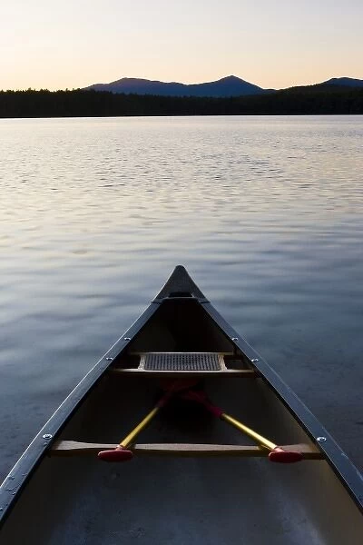 A canoe on the shore of White Lake at White Lake State Park in Tamworth, New Hampshire