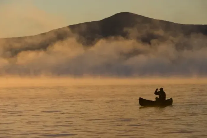 Framed Print : Canoeing in Lily Bay at sunrise, Moosehead Lake, Maine. Lily Bay Mountian is in the distance Framed Print : Canoeing in Lily Bay at sunrise, Moosehead Lake, Maine. Lily Bay Mountian is in the distance