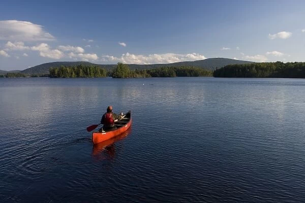 Canoeing on Prong Pond near Moosehead Lake in Maine USA (MR)