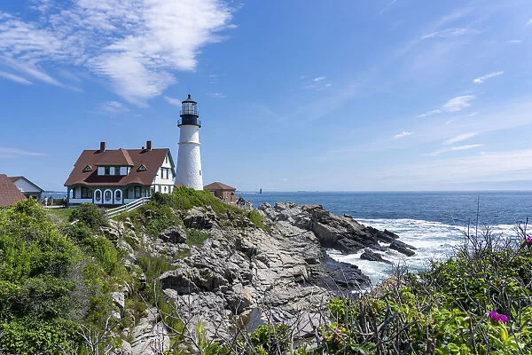 Cape Elizabeth, Maine, USA. Portland Head Light is a historic lighthouse that sits on a head of land at the entrance of the primary shipping channel into Portland Harbor, which is within Casco Bay in the Gulf of Maine