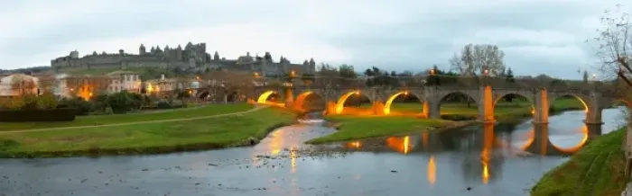 Framed Print : Carcassonne. Languedoc. The old bridge across the Aude river. Illuminated in early morning
