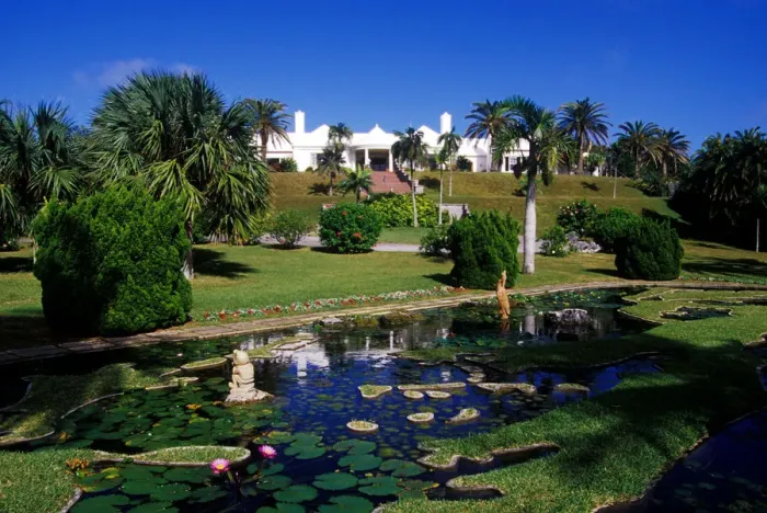 Framed Print : Caribbean, Bermuda, Devonshire Parish, Palm Grove Gardens. Reflecting pool with unique