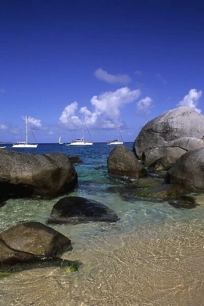 Caribbean, British Virgin Islands, Virgin Gorda, boulder rocks and boats in the choppy
