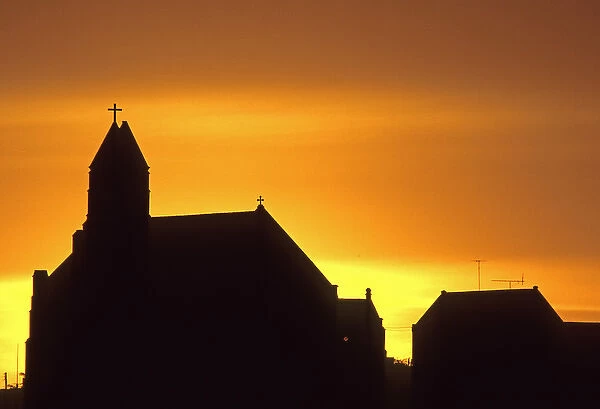 01. Caribbean, Curacao. Silhouette of a church at sunset