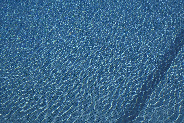 Caribbean, French West Indies, Martinique. Le Diamant: Blue water of hotel pool