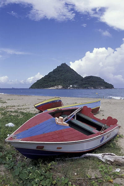 CARIBBEAN, Grenada Colorful fishing boats on beach