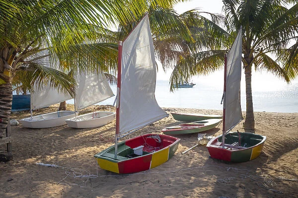 Caribbean, Grenada, Mayreau Island. Sailboats on beach. Credit as