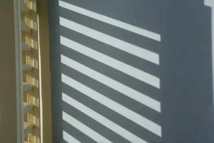 Framed Print : Caribbean, Netherlands Antilles, Curacao, Willemstad, Shadow of window shutters on blue wall Framed Print : Caribbean, Netherlands Antilles, Curacao, Willemstad, Shadow of window shutters on blue wall