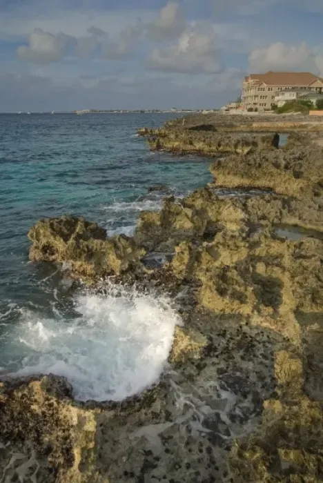 Framed Print : Caribbean Sea, Cayman Islands. Coral shoreline in George Town