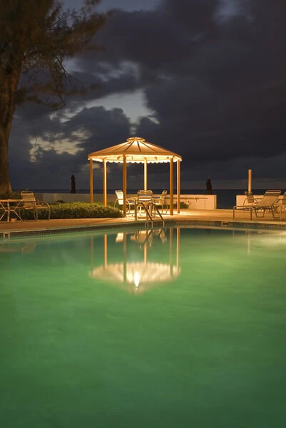 Caribbean Sea, Cayman Islands. A resort pool at night