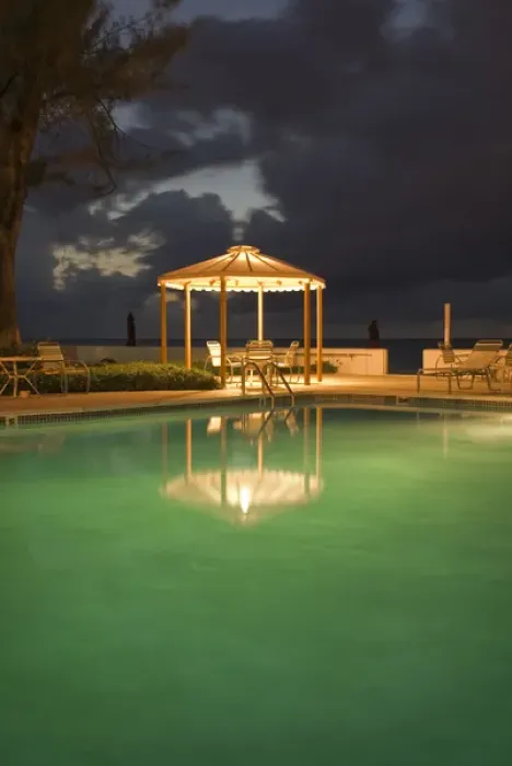 Framed Print : Caribbean Sea, Cayman Islands. A resort pool at night Framed Print : Caribbean Sea, Cayman Islands. A resort pool at night