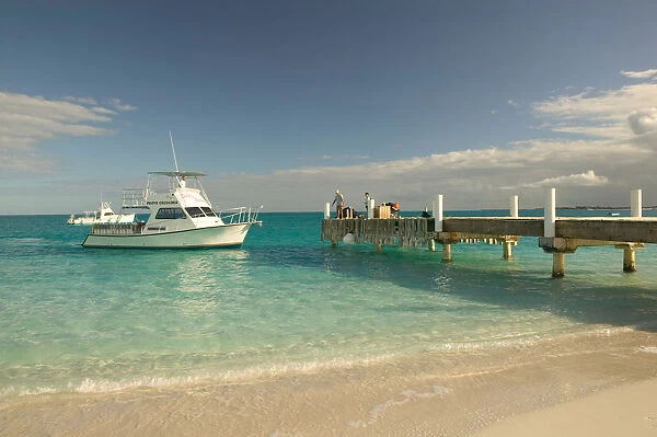 Caribbean, TURKS & CAICOS-Providenciales Island-Grace Bay: Dive Boats & Pier (NR)