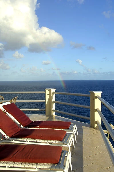 Caribbean, U. S. Virgin Islands. Deck chairs overlooking the ocean