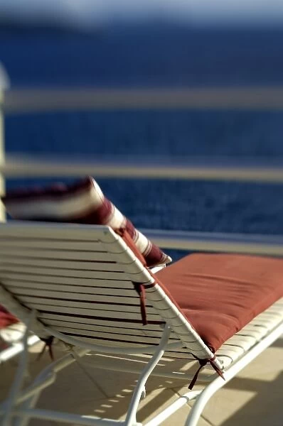 Caribbean, U. S. Virgin Islands. Deck chairs overlooking the ocean