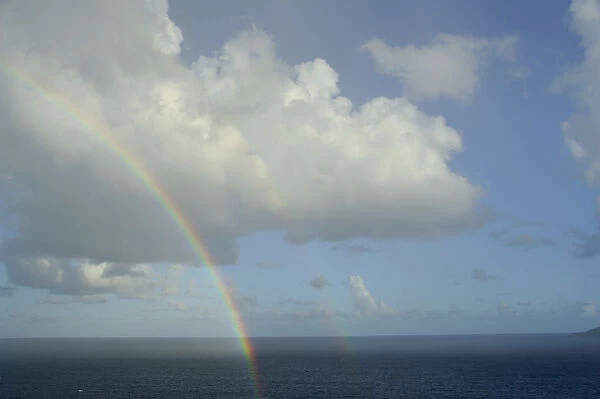 Caribbean, U. S. Virgin Islands, St. Thomas. Seascape with rainbow over the Atlantic