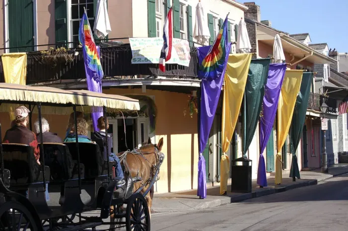 Framed Print : Carriage rides in the Mardi Gras decorated French Quarter, New Orleans, Louisiana