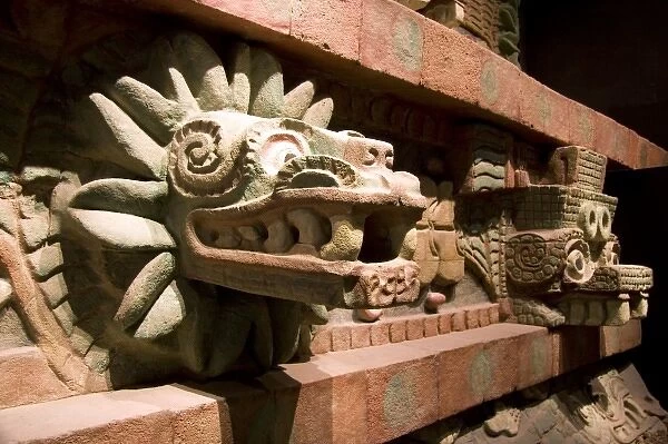 Carved serpent head is an artifact from Teotihuacan on display at the National Museum