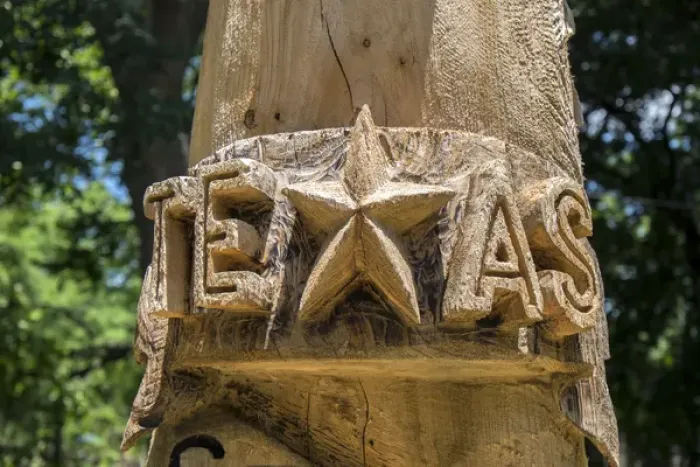 Framed Print : Carved totem pole art with Texas star, Wimberley, Texas, USA, For Editorial Use Only Framed Print : Carved totem pole art with Texas star, Wimberley, Texas, USA, For Editorial Use Only