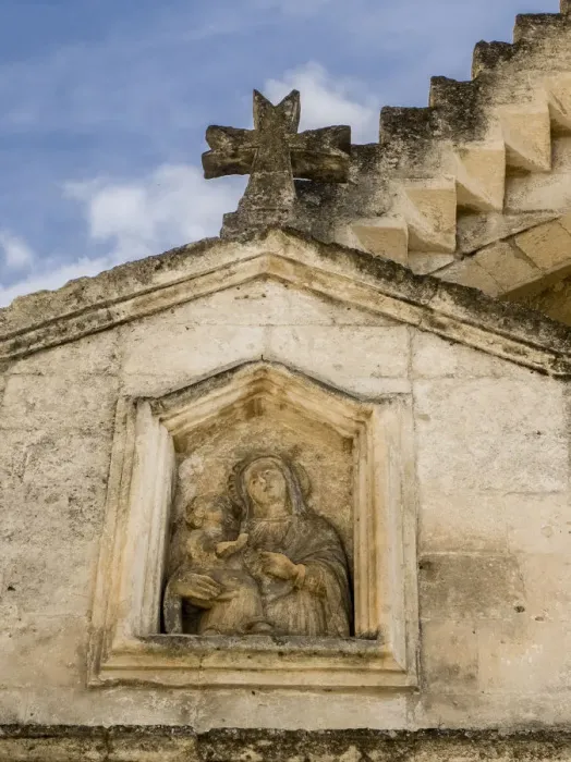 Framed Print : Carving on a small chapel in old town Matera